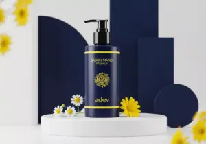 Botol pump sabun mandi cair premium dengan label brand adev dikelilingi bahan alami estetik.